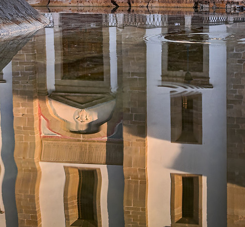 Evora Fountain Reflection